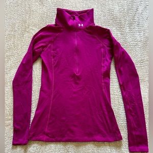 Under Armour women’s size XS cold gear zip up pullover in magenta.